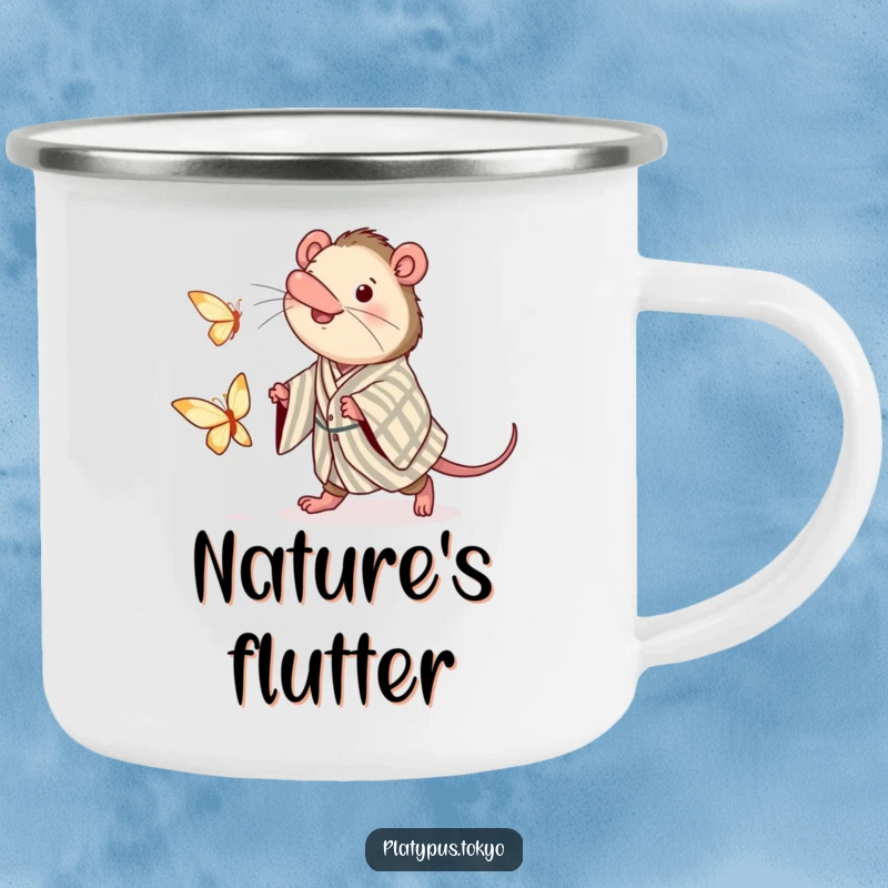 Funny enamel camping mug featuring a platypus in a kimono, joyfully chasing a paper butterfly under the open sky.
