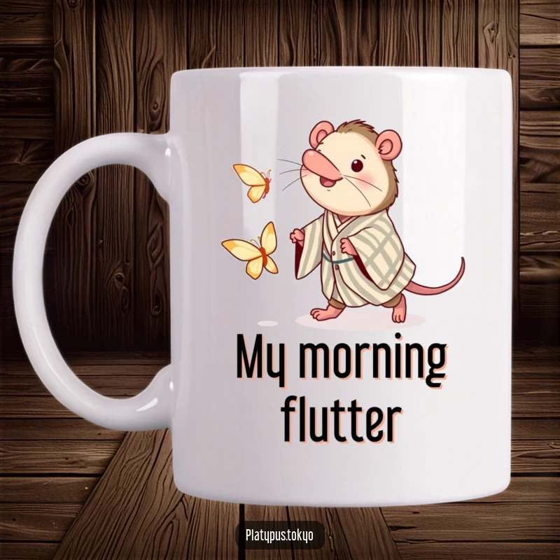 Funny mug featuring a platypus in a striped kimono, joyfully chasing a delicate paper butterfly with great excitement.