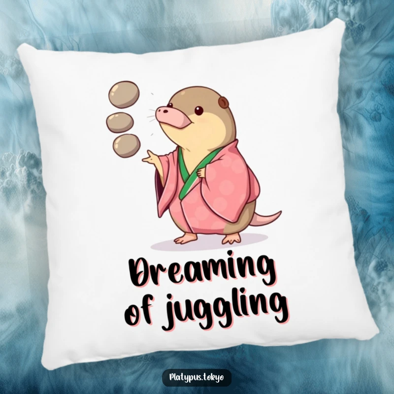 Funny Pillow showing a platypus in a vibrant kimono playfully juggling three smooth, round pebbles, perfect for comfort.