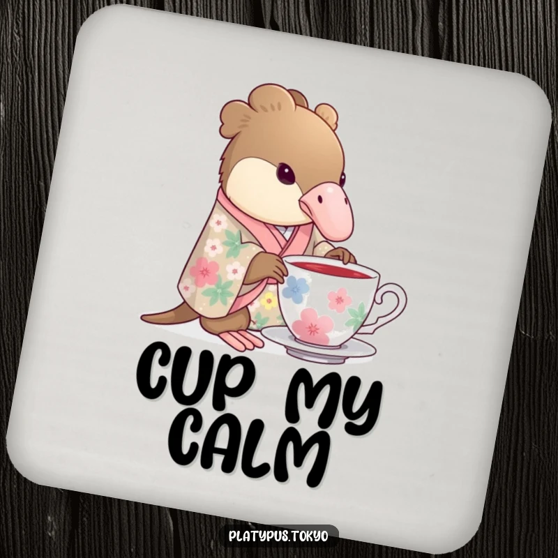 Funny Drink Coaster with a platypus wearing a floral kimono gracefully dipping its beak into a teacup, protecting surfaces.