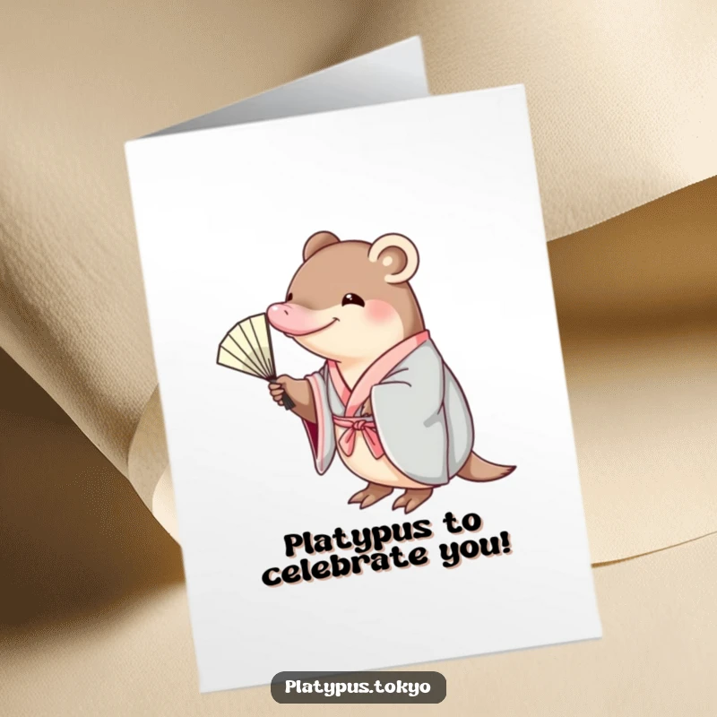 Funny Free Printable Birthday Card: Platypus in a floral kimono gracefully reaching for a delicate fan, elegant and humorous.