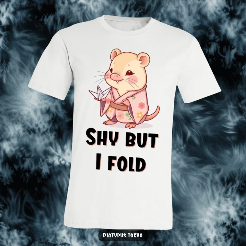 Funny platypus t-shirt featuring a shy animal in a floral kimono, presenting a meticulously folded paper crane, embodying serenity.